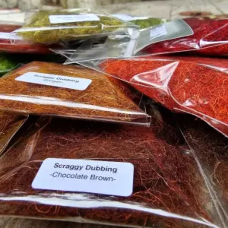 KINDALE SCRAGGY DUBBING|BLACK|BLOOD RED|BROWN|CHOCOLATE BROWN|CLARET|DARK CLARET|FIERY BROWN|FL CHARTREUSE|FL DARK NATURAL GREY|FL FIRE ORANGE|FL GREEN|FL NATURAL GREY|FL RED|GINGER|GOLDEN OLIVE|IRON BLUE DUN|JADE GREEN|LIGHT OLIVE|MEDIUM OLIVE|MOSS BROWN