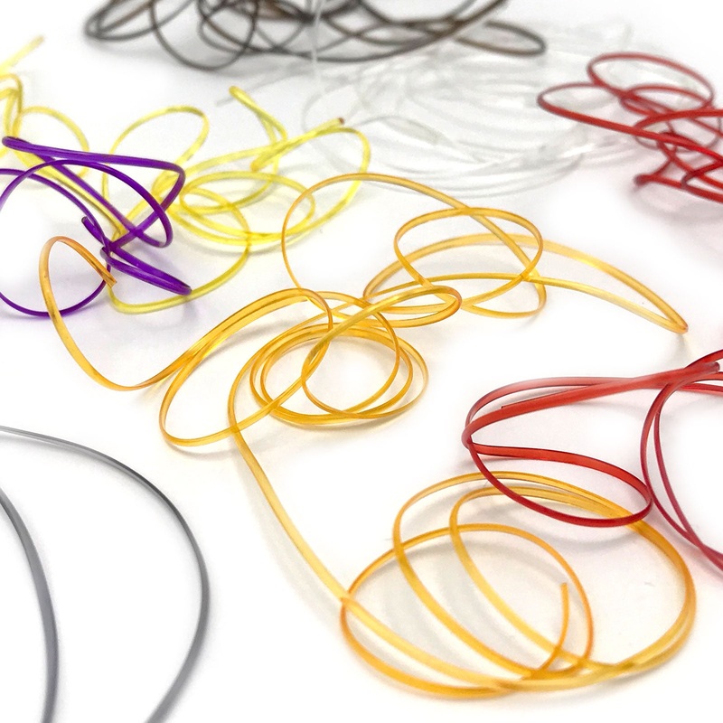 Hareline Half Round D-Rib|Small|Medium|Amber|Black|Blood Red|Brown|Chartreuse|Clear|Dark Gold Stone|Fluorescent Shrimp Pink|Gray|Light Gold Stone|Light Olive|Olive|Olive Brown|Orange|Pink|Purple|Red|Root Beer|Rust|Tan|Yellow|Peach