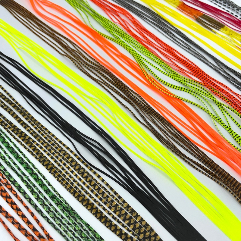 Hareline Magnum Predator Legs|Barred Clear|Barred Frog Green|Barred Orange|Barred Pumpkin|Black|Fluorescent Chartreuse|Fluorescent Orange|Grizzly Barred Fl. Chartreuse|Grizzly Barred Fl. Orange|Grizzly Barred Rootbeer|Grizzly Barred Smoke|Hot Yellow|Orang